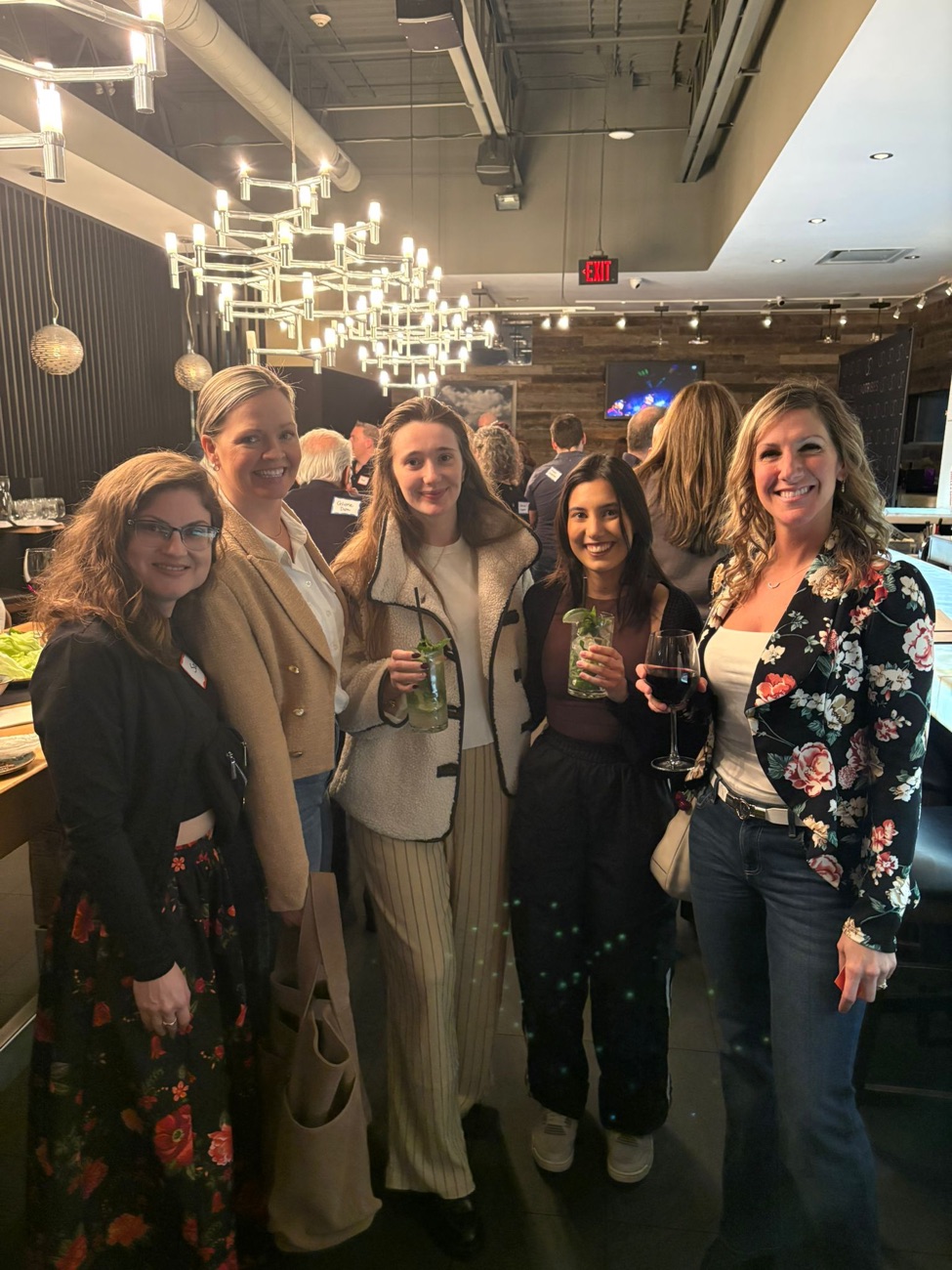 Brandi Clarke with colleagues at a networking event
