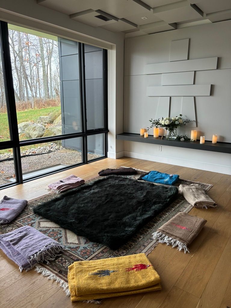 Gathering room set with blankets and candles